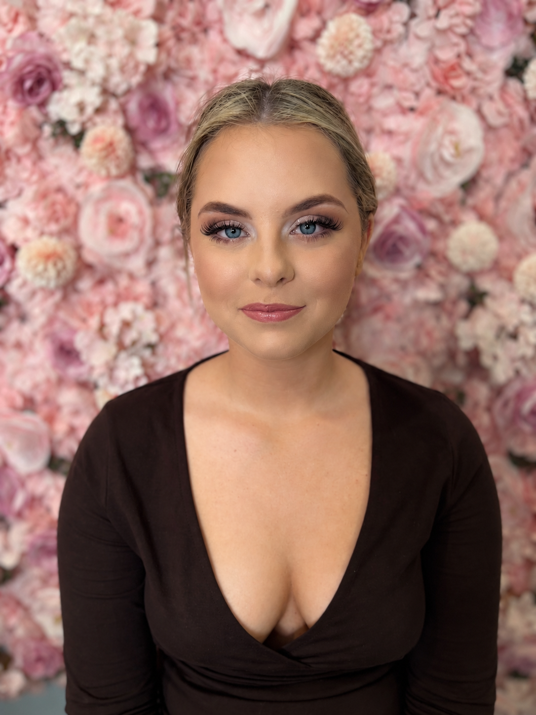 Polished event makeup with defined lashes and luminous skin by Grace Studios CQ